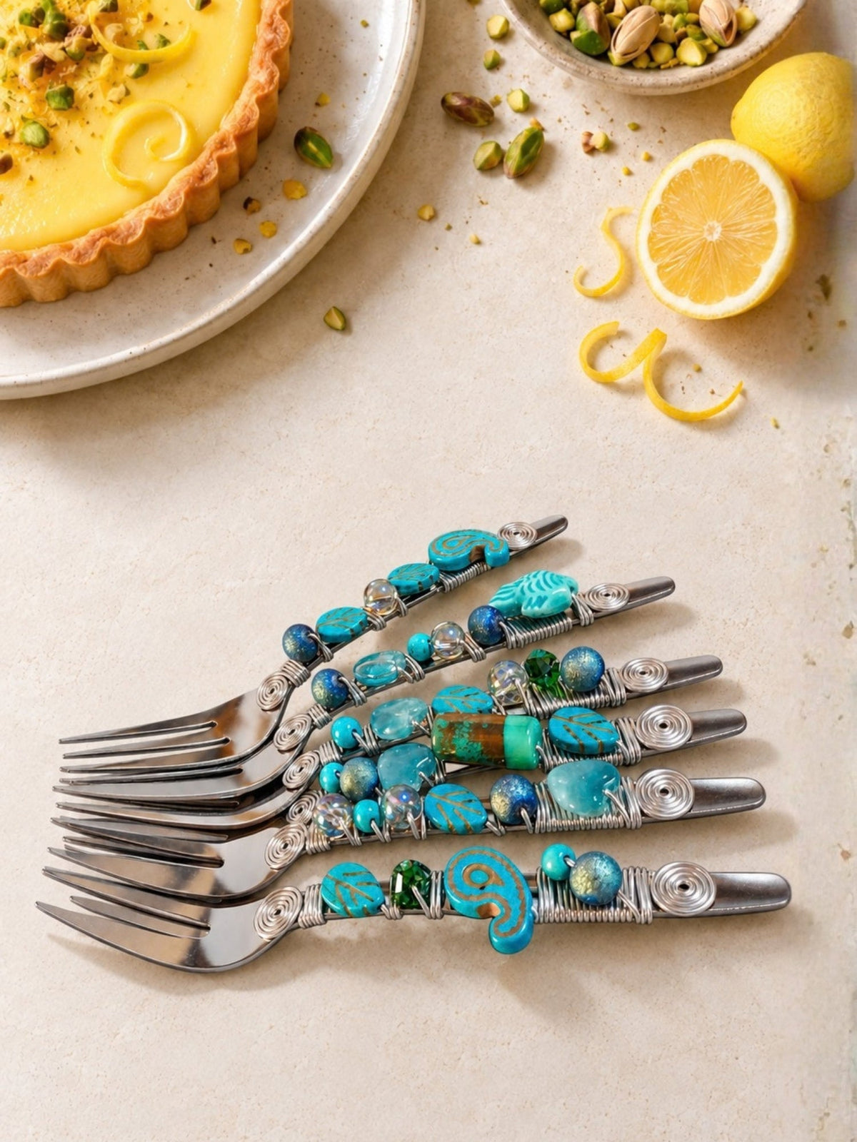 Six pastry forks with turquoise, blue and green beaded handles