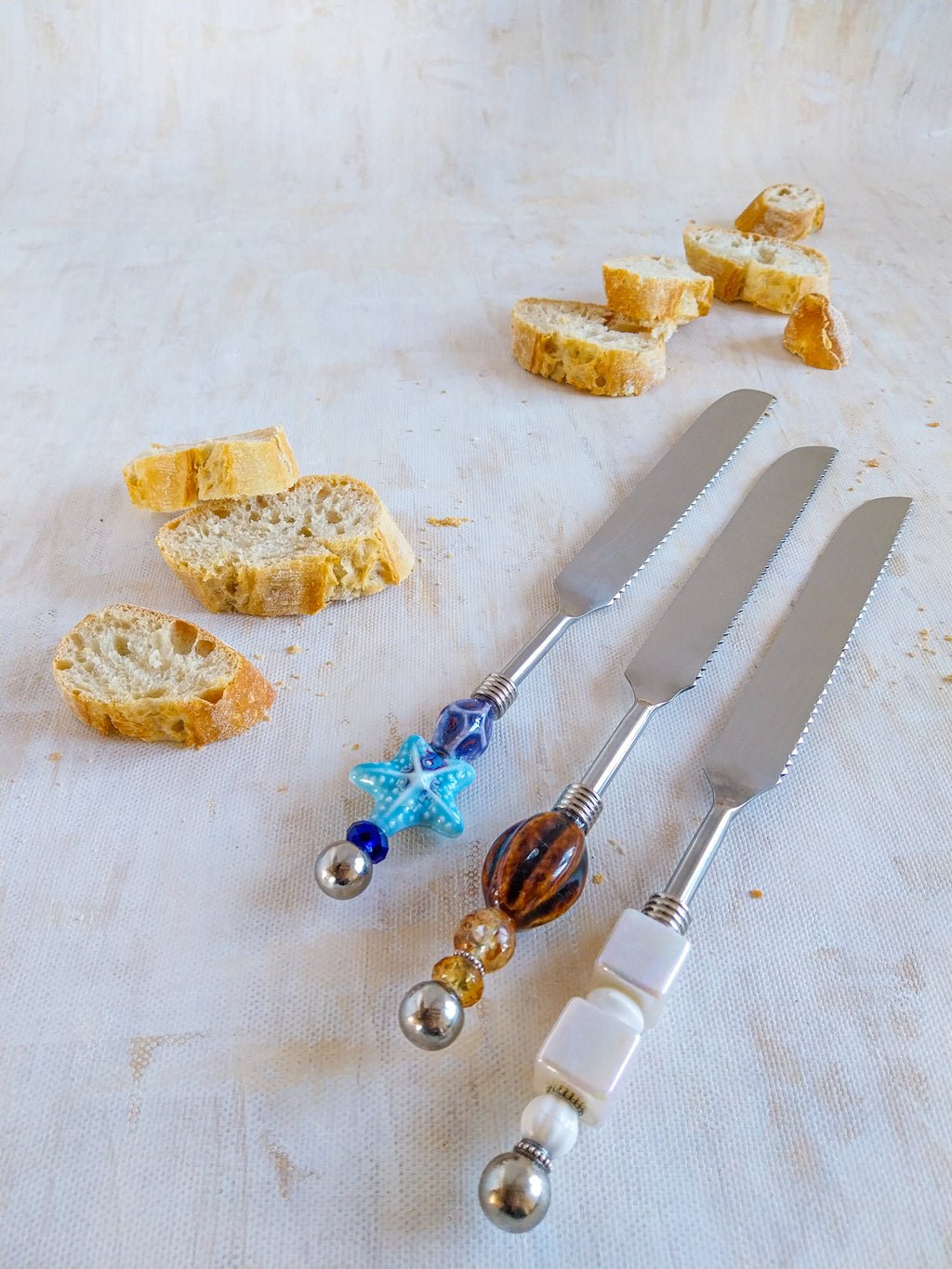 Beaded Bread Knifes to Slice through crusty loaves with ease. Culinary masterpieces that elevate bread-cutting to new heights