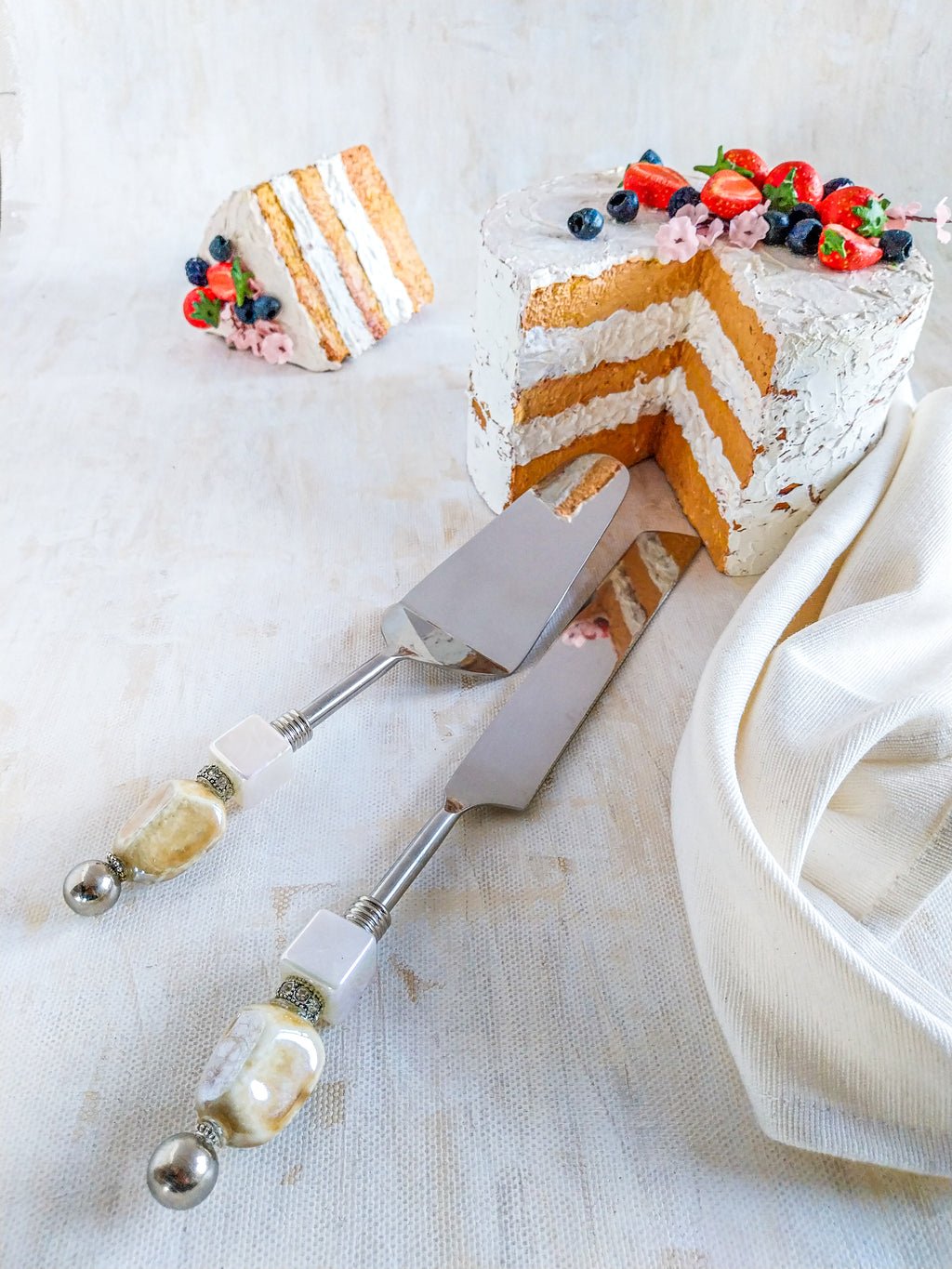 Beaded Cake Servers for dessert-serving luxury. Handcrafted with care, each server features dazzling beads or coastal shells