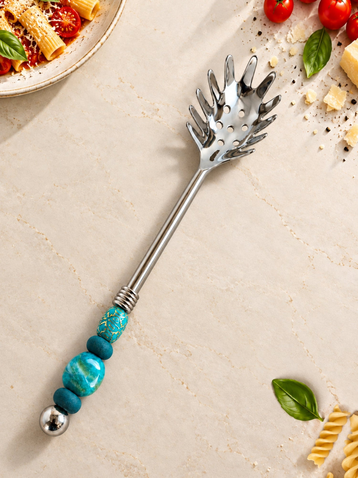 Pasta serving spoon with a turquoise and blue beaded handle