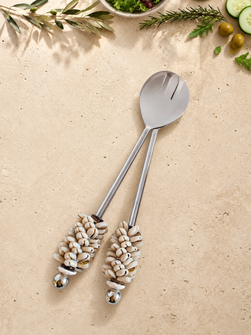 The Baiza salad set with handcrafted cowrie shell handles by Zapurah.