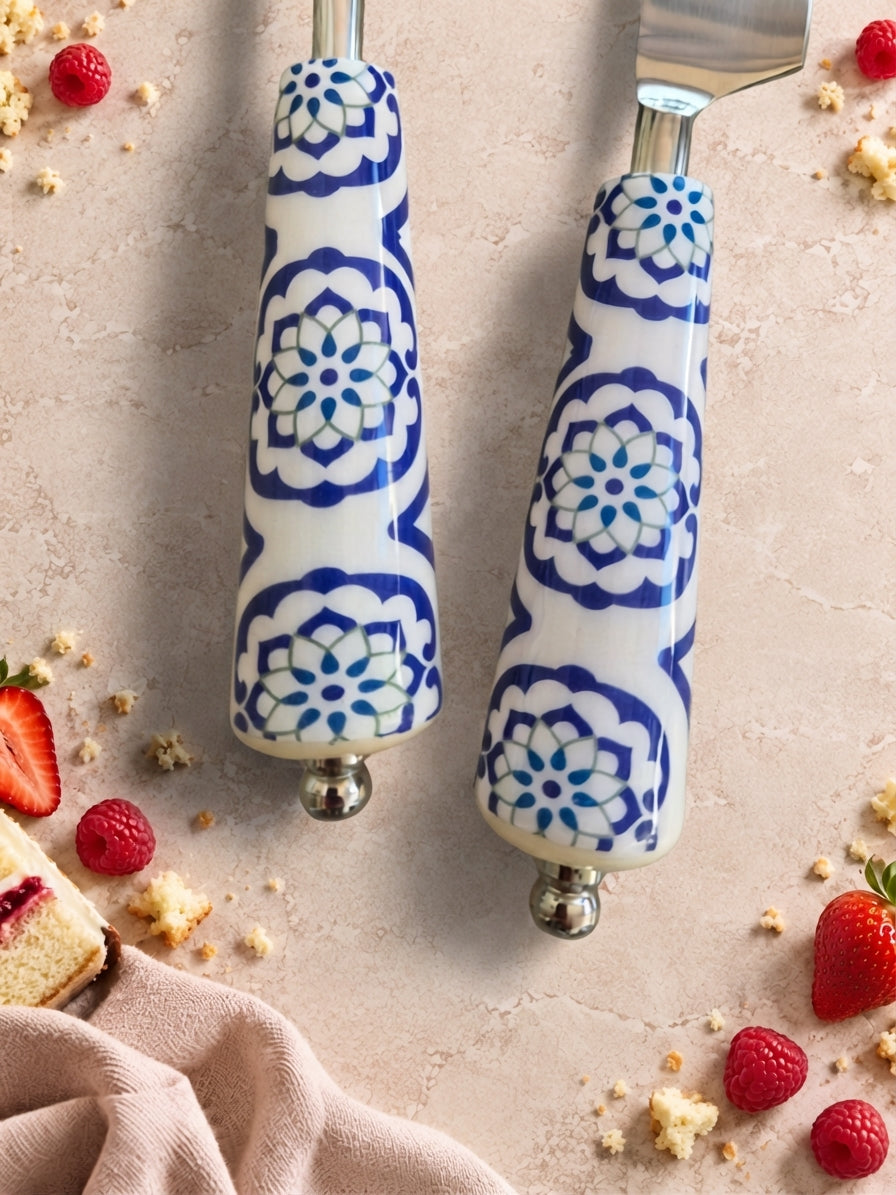 The Asri cake knife and server with blue and white patterned handles