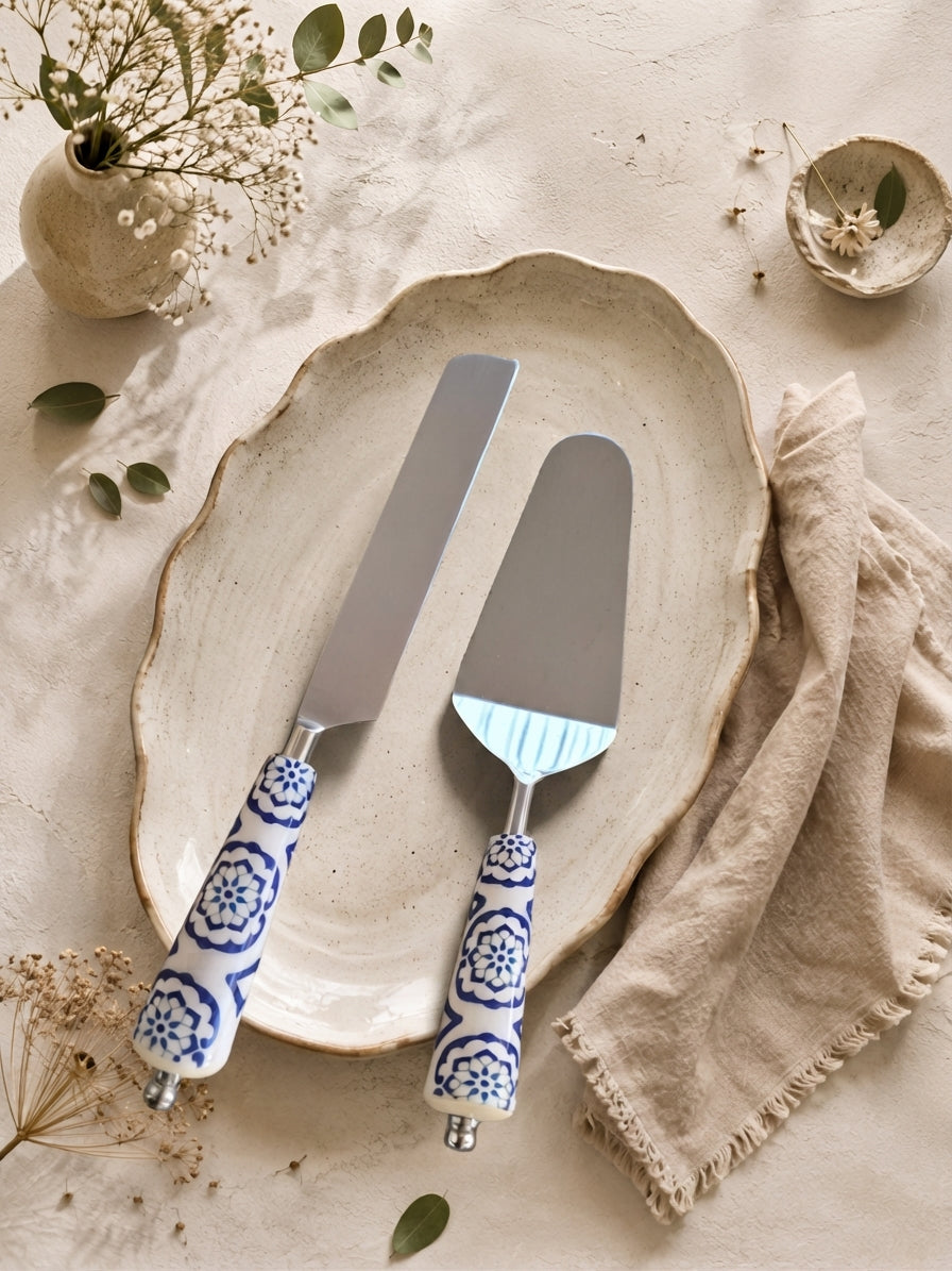 The Asri cake serving set with blue and white decorative handles