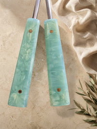 Close up of the jade green marbled resin handles with silver stems, The Calia