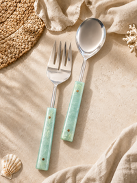 The CALIA Salad Servers by Zapurah with aqua resin handles and silver finish