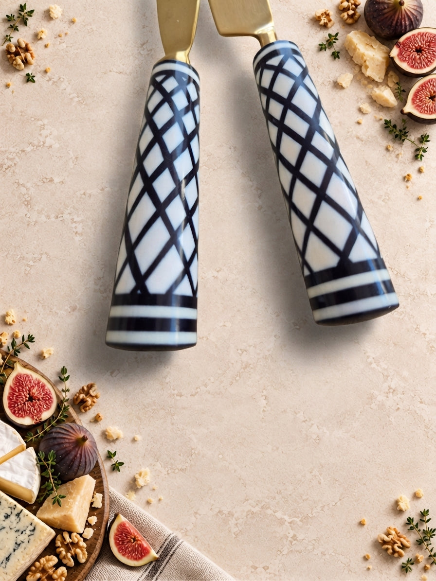 Detail of the black and white patterned handles on The Elara cheese knife set