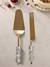 The EMBUN Cake Serving Set by Zapurah with clear beaded handles and gold finish