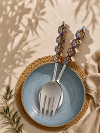 Salad serving spoon and fork with silver heads and translucent smoky brown beaded handles, The Kalina