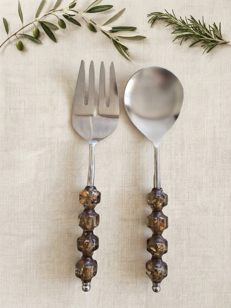 The Kalina Salad Servers by Zapurah with smoky brown beaded handles and silver finish