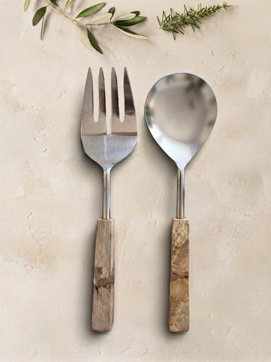 The Kumala Salad Servers by Zapurah with natural marbled resin handles and silver finish