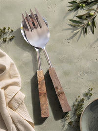 The Kumala salad serving spoon and fork with silver heads and marbled brown and cream resin handles