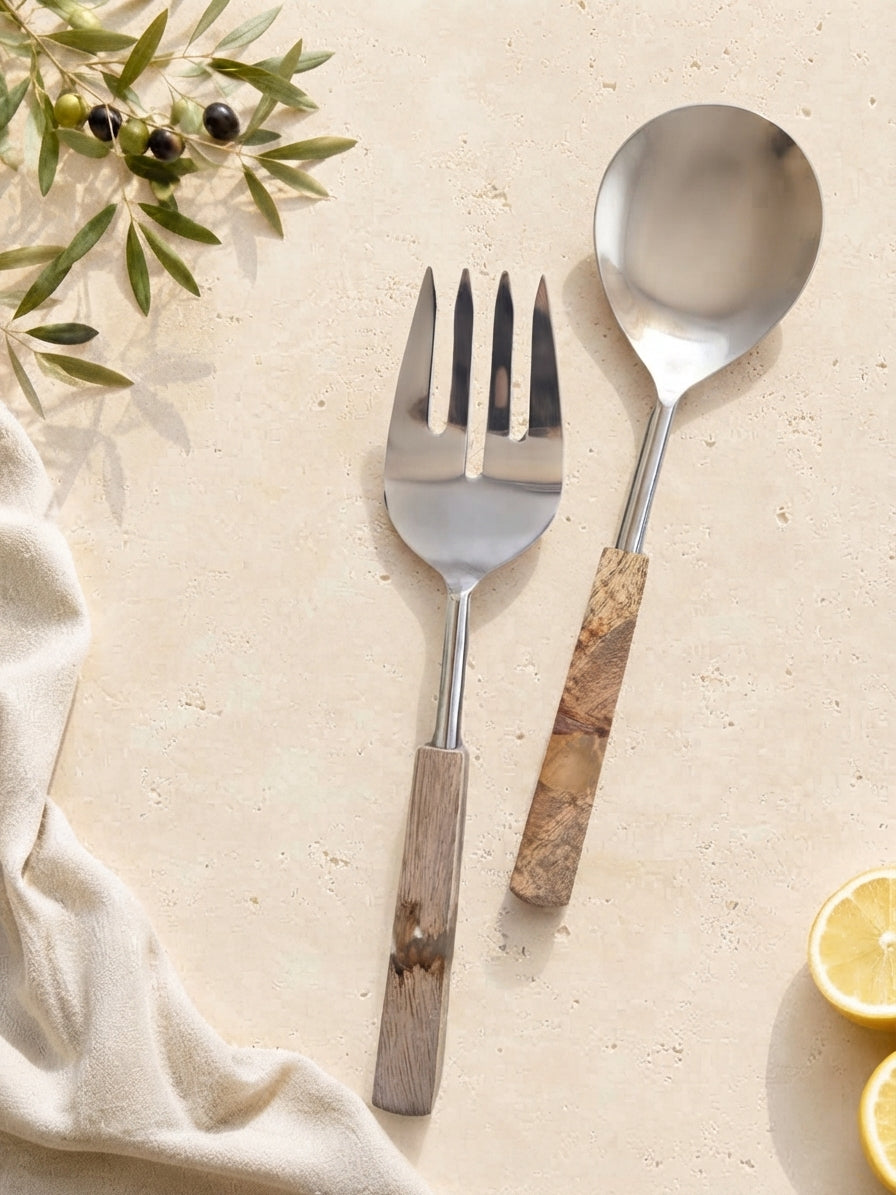 The Kumala salad serving set with silver heads and marbled beige, brown and cream handles