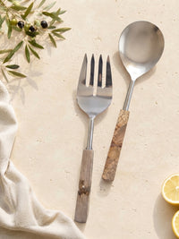 The Kumala salad serving set with silver heads and marbled beige, brown and cream handles