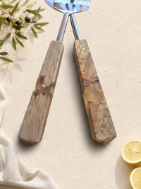 Close up of the marbled brown, cream and beige resin handles with silver stems, The Kumala