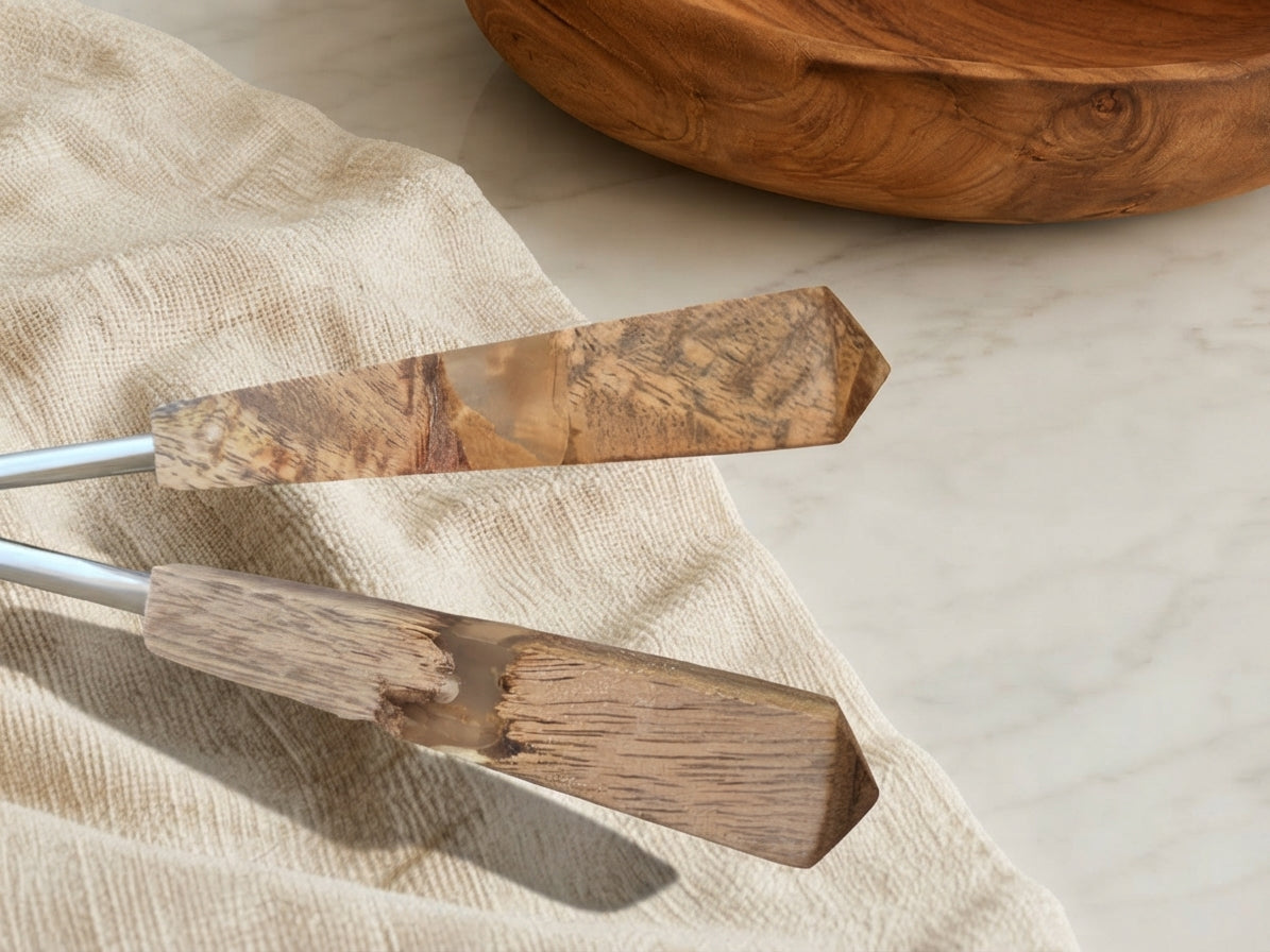 Detail of the marbled brown, cream and beige resin handles on The Kumala salad serving set 