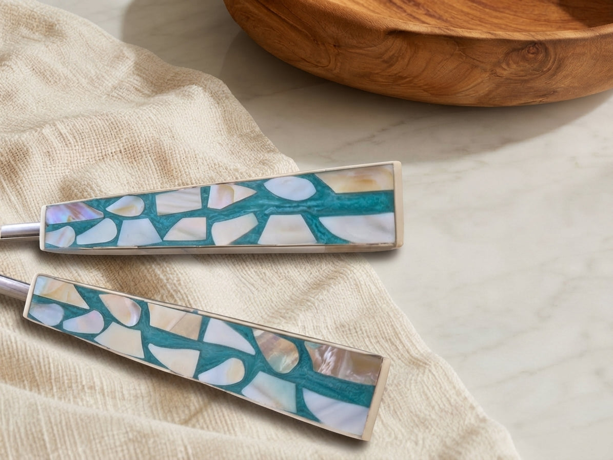 Detail of the turquoise, white and beige mosaic handles on The Laraya salad serving set