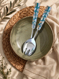 Salad serving spoon and fork with silver heads and turquoise mosaic handles with white and beige accents from The Laraya