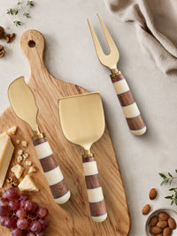 Detail of the brown and ivory striped handles on The Nalaya cheese knife set
