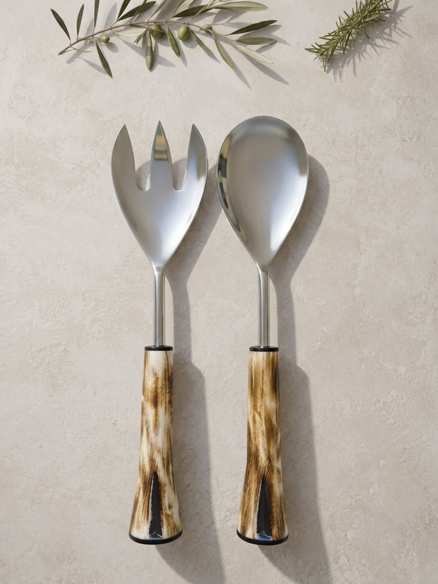 The Nalira Salad Servers by Zapurah with brown and ivory resin handles and silver finish