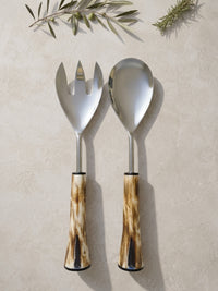 The Nalira Salad Servers by Zapurah with brown and ivory resin handles and silver finish