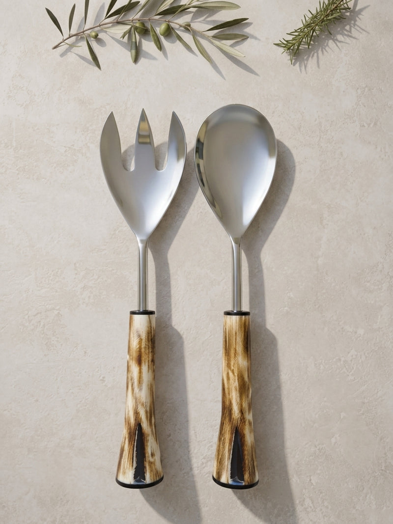 The Nalira Salad Servers by Zapurah with brown and ivory resin handles and silver finish
