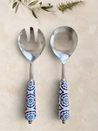 The Ravina Salad Servers by Zapurah with blue and white patterned handles and silver finish