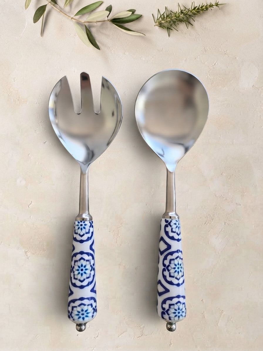 The Ravina Salad Servers by Zapurah with blue and white patterned handles and silver finish