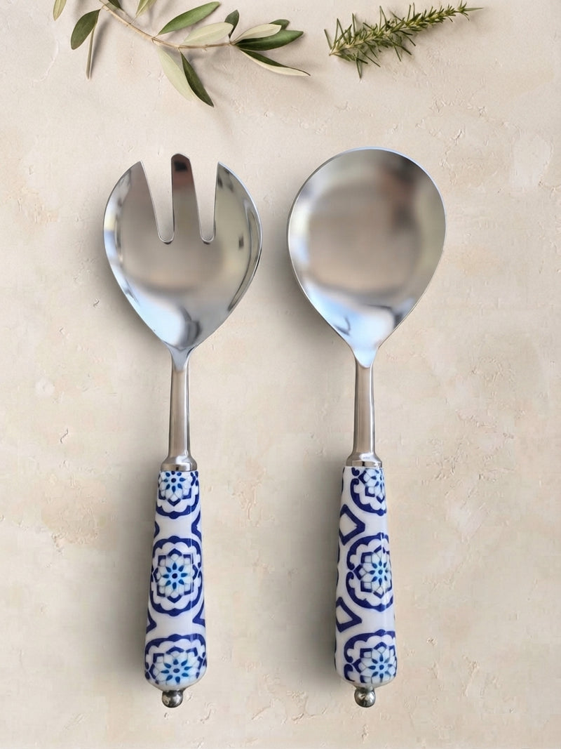 The Ravina Salad Servers by Zapurah with blue and white patterned handles and silver finish