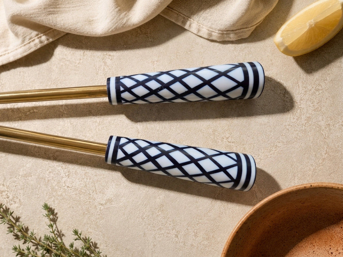 Detail of the Savira black and white patterned handles with gold coloured metal accents