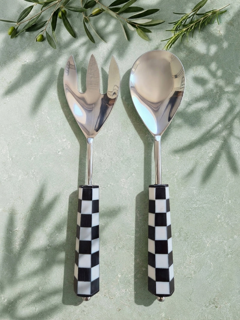 The Talisa Salad Servers by Zapurah with black and white checkerboard resin handles and silver finish